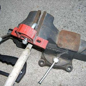 pic26 - removing hangers from muffler strap