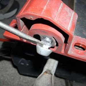 pic27 - removing hangers from muffler strap 2