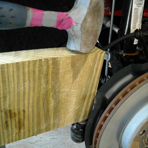 pic7 - tap out tie rod end from carrier