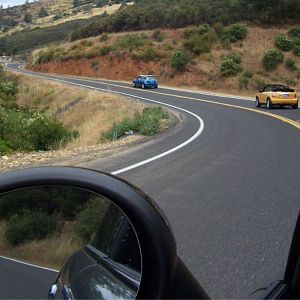 Three car family having fun on a weekend run