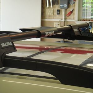 The Yakima Windjammer air foil does reduce / eliminate bar wind noise at highway speed. The Moon roof does clear the cross bar However note that I do