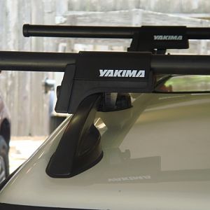 The 58" bars do extend past the roof rails 11" on each side. The 58" bars do not extend past the metal body panels. If you have the 58", or longer, ba