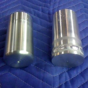 Tig welded a back on the gauge cup and turned it on a metal lathe