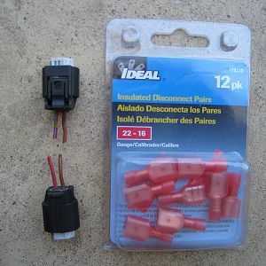 stock connectors next to disconnects used to wire up the Hellas