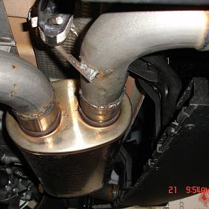 Magnaflow muffler (Camaro Type, 18" long compared to 14" muffler used for the Countryman sys.), 2.5" piping. Done by Mike's Muffler In El Monte, CA. (