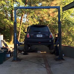 Outdoor lift setup at Other Side of Life Garage. Here with Colin from Greene Performence.