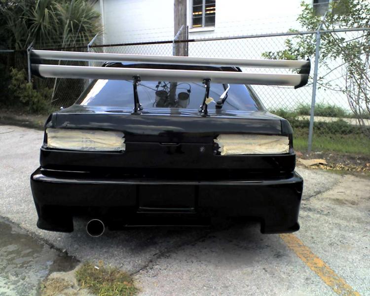 carbon fibre tail lamps...oops never mind, they were signed for, but alas, have gone missing...The rather ricey tail seems to look about two feet wide