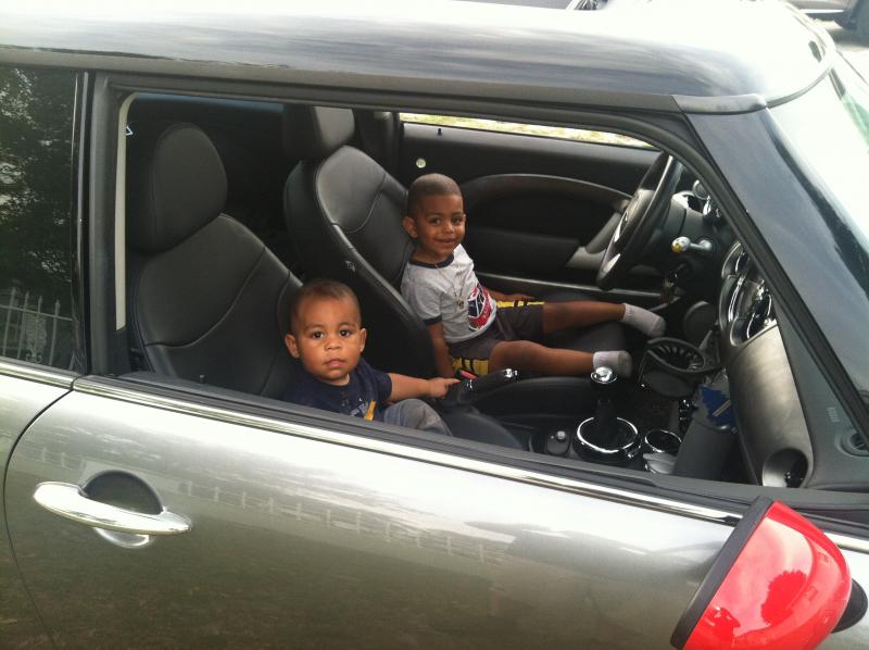 My two beautiful boys enjoying my Mini.